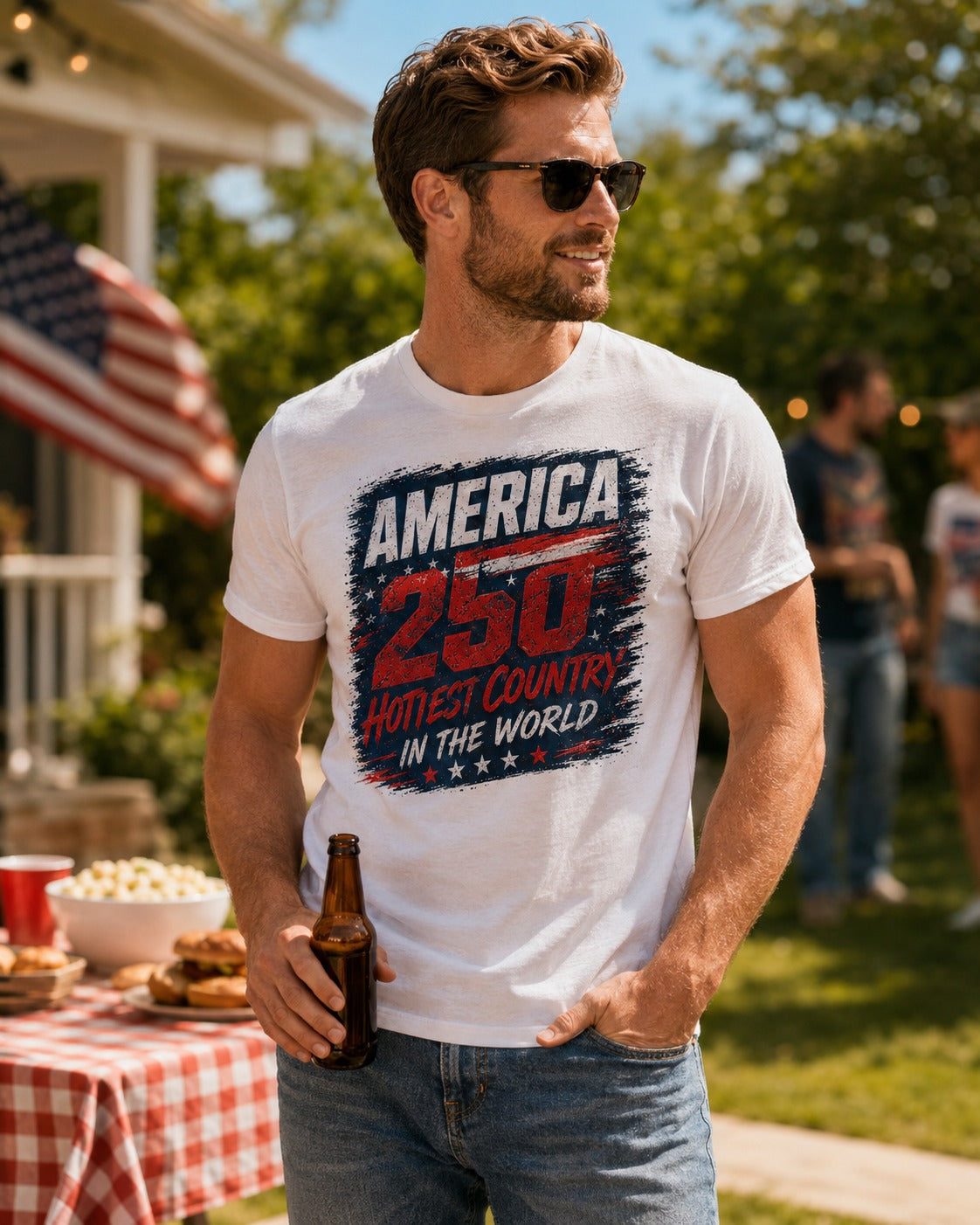 Model wearing White America 250 Bold Flag patriotic t-shirt at summer BBQ